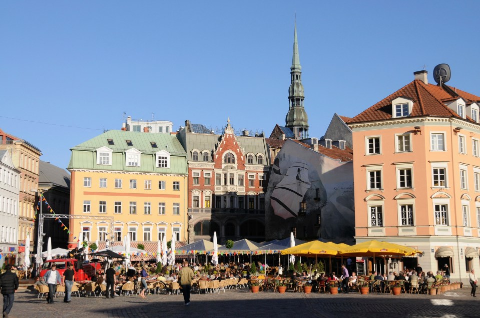 Cathedral Square in Riga, Latvia, with outdoor cafes.