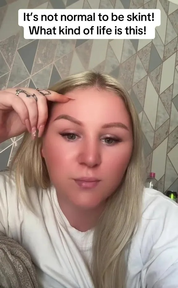 Woman expressing frustration about being financially struggling.