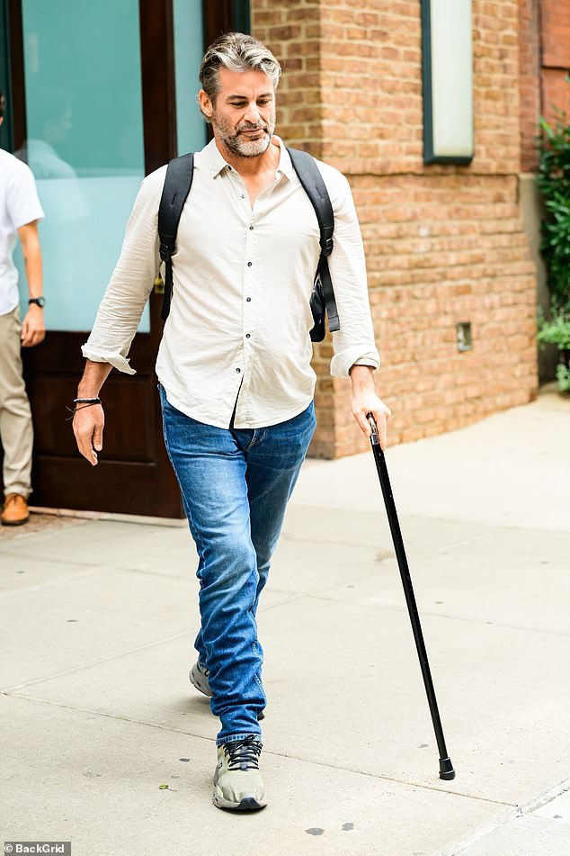 She was joined by her hypnotist boyfriend Jim Curtis, 49, who sported a can after raising concerns about a mystery injury when he was seen hobbling around earlier this week