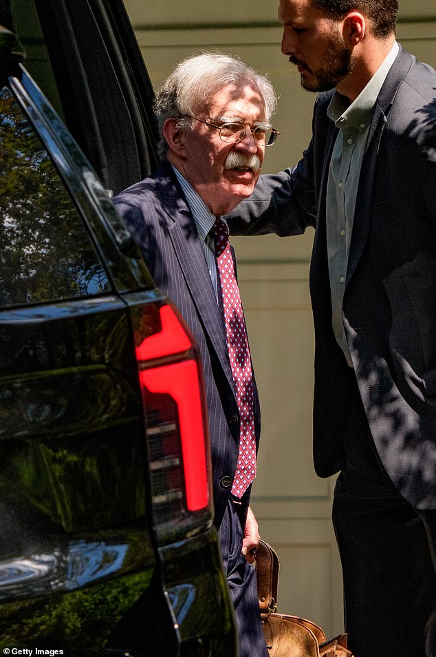 John Bolton arrived to his house after a nearly eight hour raid of his home by the FBI on Friday