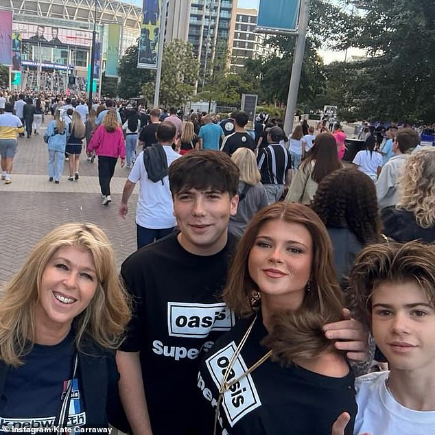 Kate Garraway has shared her gushing thanks to a 'gallant stranger' for his sweet act of kindness at an Oasis gig in London (Seen with children Darcey and Billy)
