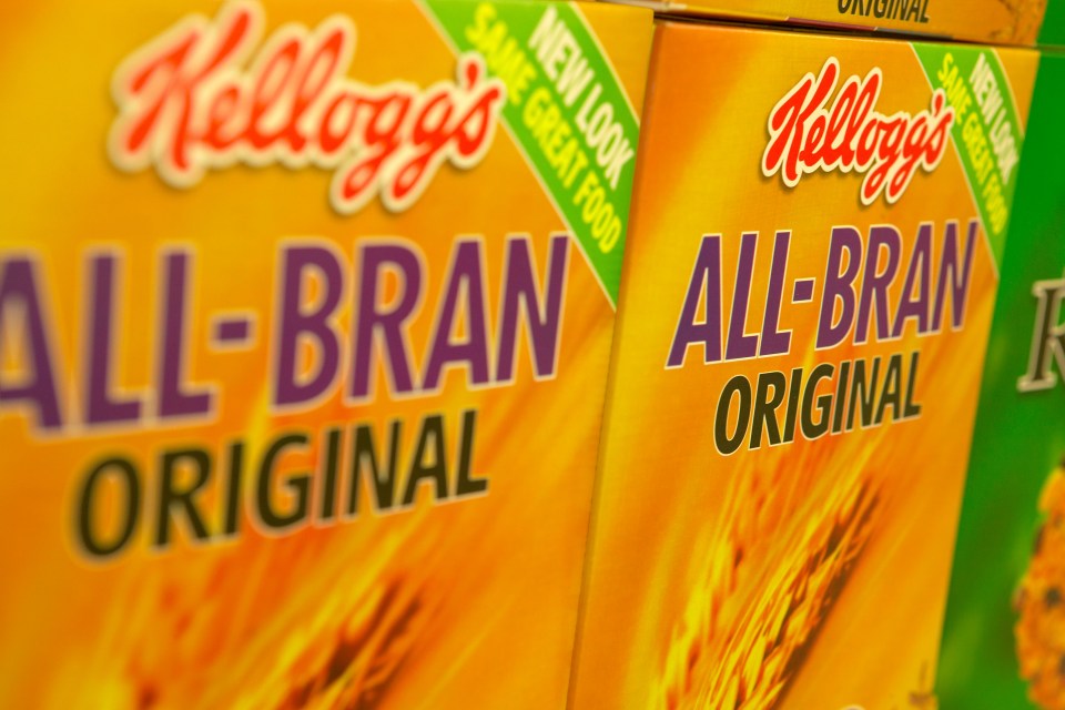 Kellogg's All-Bran Original cereal boxes on a supermarket shelf.