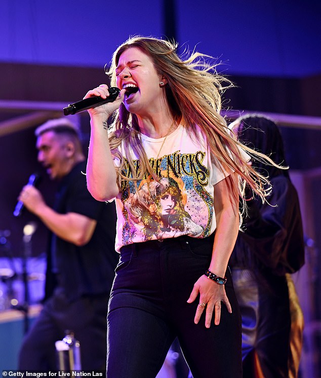 Kelly Clarkson threw her fans for a loop when she announced that heartbreaking family news involving her ex-husband Brandon Blackstock had forced her to postpone her remaining Las Vegas residency shows in August; pictured July 11 in Las Vegas