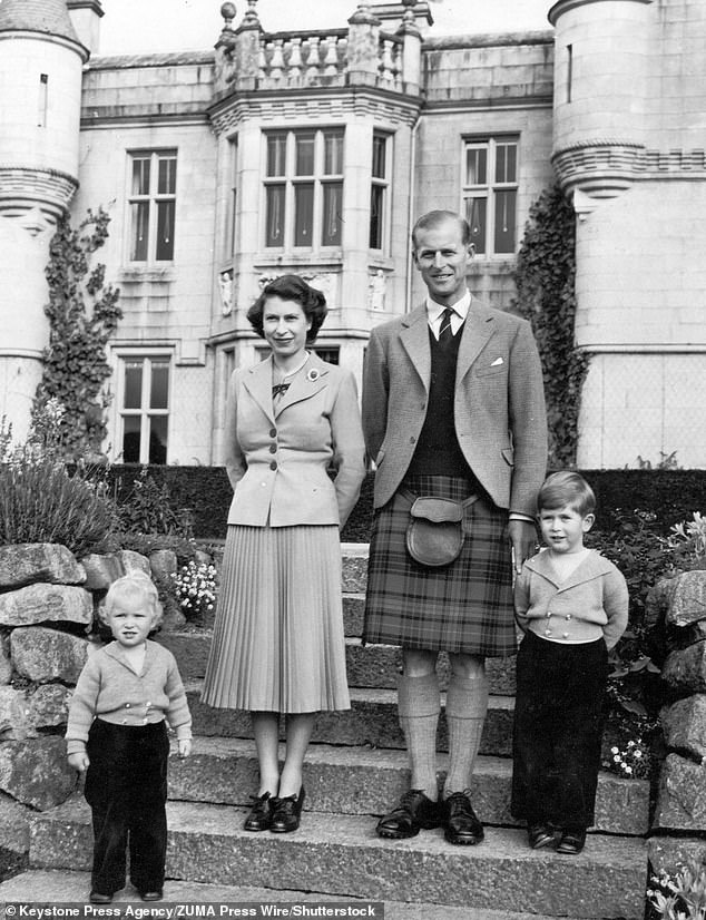 The Scottish palace was also widely known to be one of the late Queen's favourite residences. Pictured: The late Queen with her late husband Prince Philip and a young Princess Anne and King Charles at Balmoral in 1953