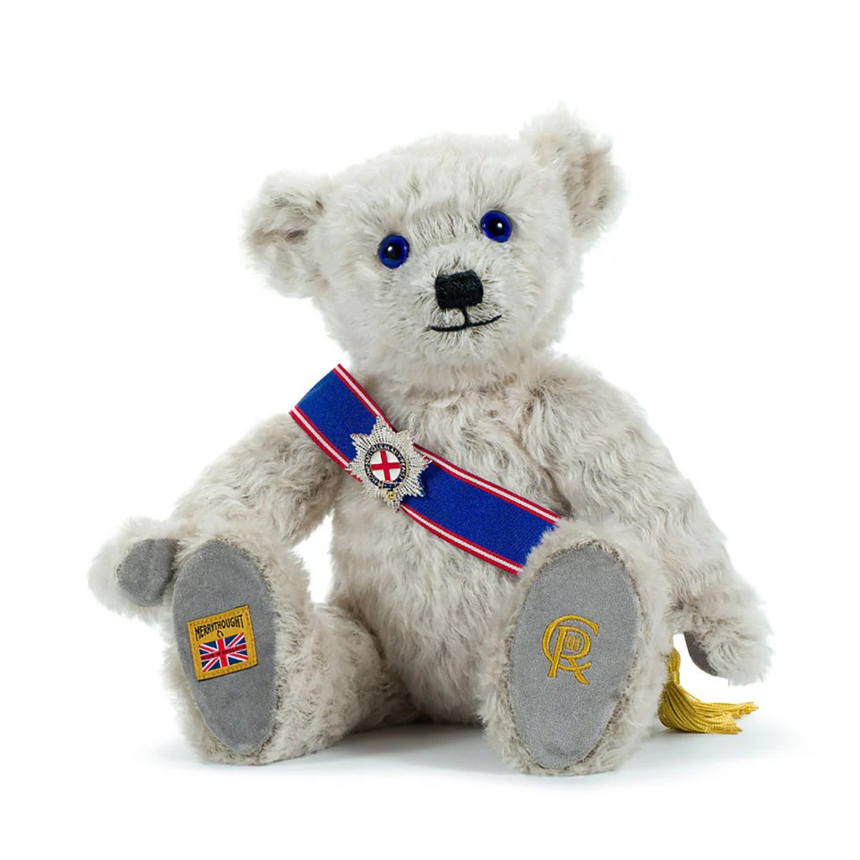 King Charles III teddy bear wearing a royal sash.