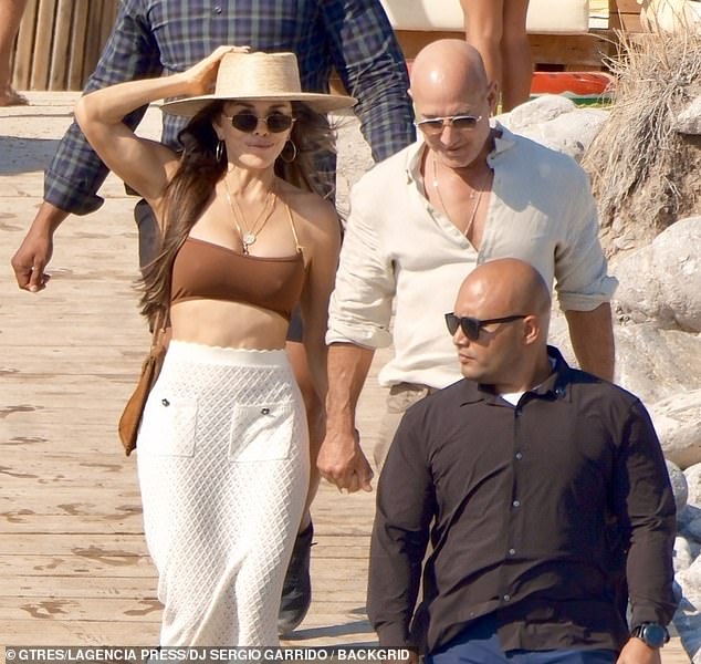 The beauty, 55, was joined by her billionaire Amazon CEO husband Jeff Bezos , 61, for lunch on the party island before heading to their mega luxury yacht