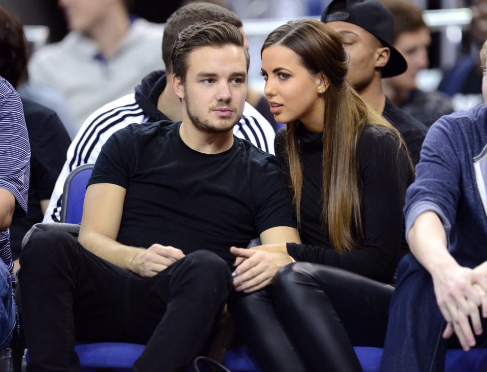 Liam Payne and Sophia Smith at a basketball game.