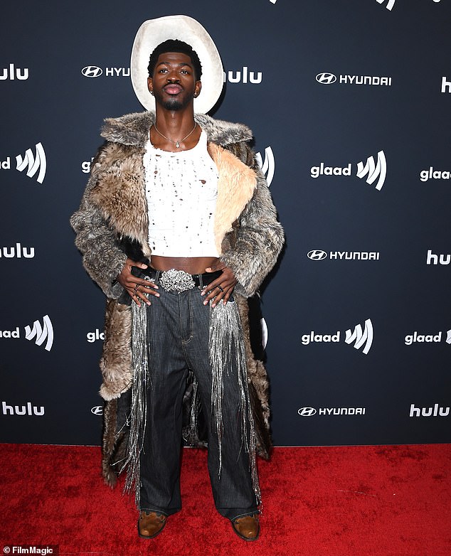 During the rapper's arrest he allegedly hit an officer before being taken to the hospital for treatment for a possible overdose; Pictured In Beverly Hills in March