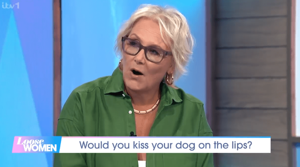 Screenshot of a woman on Loose Women discussing whether she would kiss her dog on the lips.