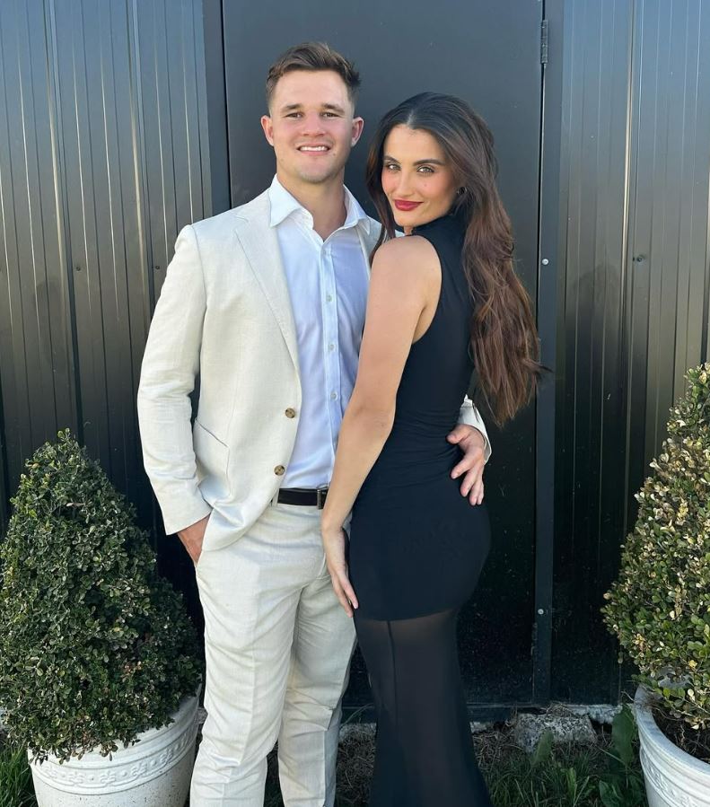 Couple posing for a photo.