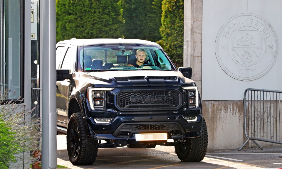 Erling Haaland in his Ford F-150 Shelby Super Truck at the Manchester City training complex.