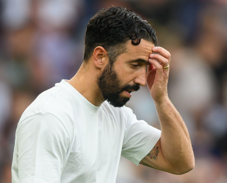 Manchester United manager Ruben Amorim looking downcast after a match.