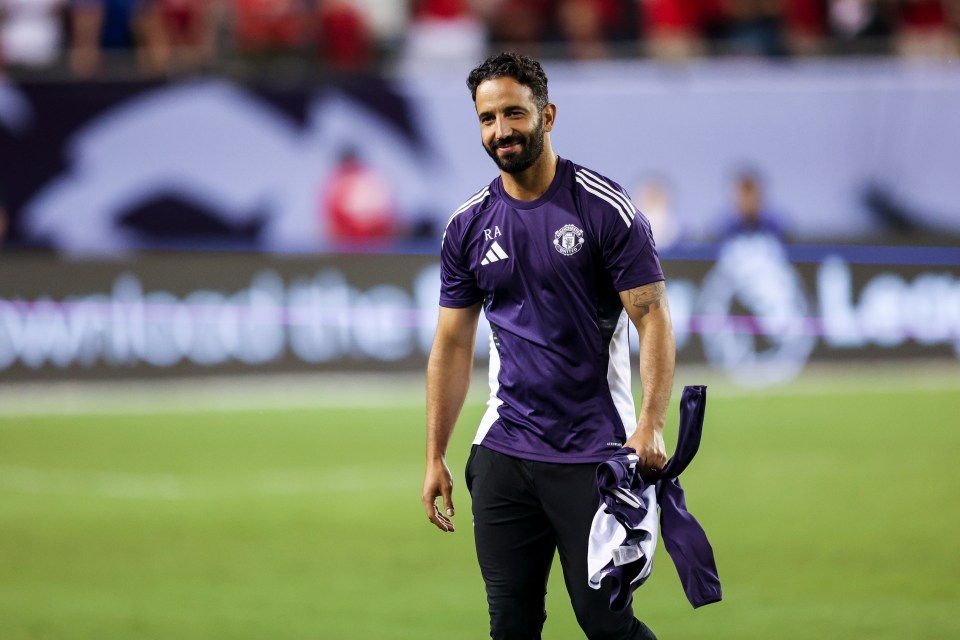 Ruben Amorim, head coach of Manchester United, on a soccer field.
