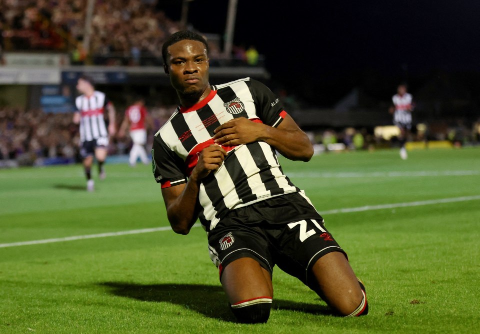 Grimsby Town's Tyrell Warren celebrating a goal.