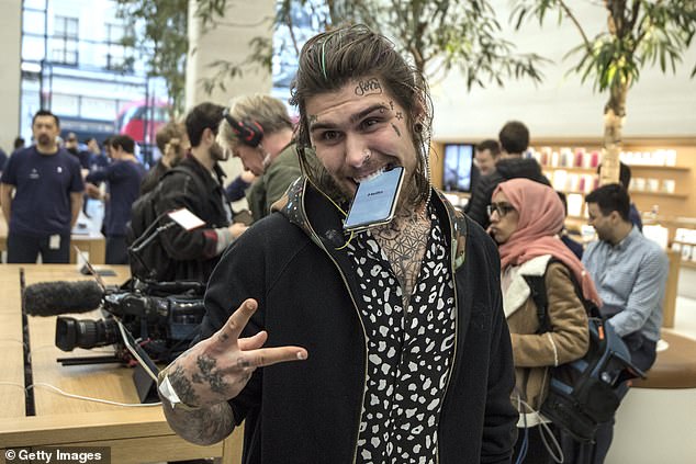 Marco is pictured here in November 2017 when he was one of the first to buy the iPhone X when it was released that month