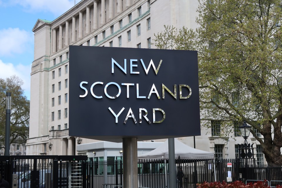New Scotland Yard sign outside Metropolitan Police Headquarters.