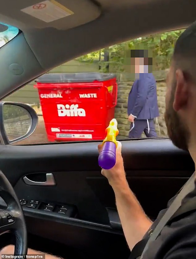 Two young men were seen in a video driving around Manchester and laughing as they sprayed adults and children wearing orthodox clothing