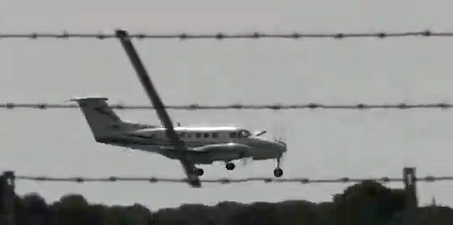 A plane skidded down the runway to make an emergency landing at Birmingham Airport today forcing the cancellation of scores of flights until at least 8pm