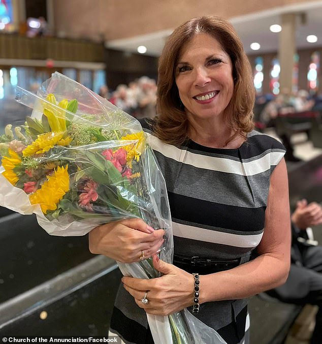 Mary Westman, the mother of shooter Robin Westman, 23, used to work at the Annunciation Church where the horror unfolded on Wednesday morning. She is pictured inside the church at her retirement in 2021