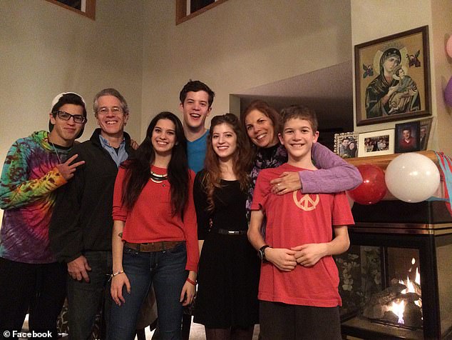 The youngest of three children whose parents divorced in 2013, Robin Westman (seen front right with her family) lived in Hastings, Minnesota, before Mary and Jim split (second from left)