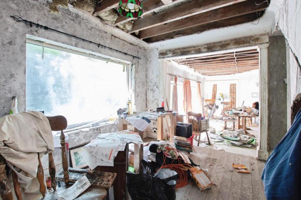 A dilapidated four-bedroom house in need of refurbishment.