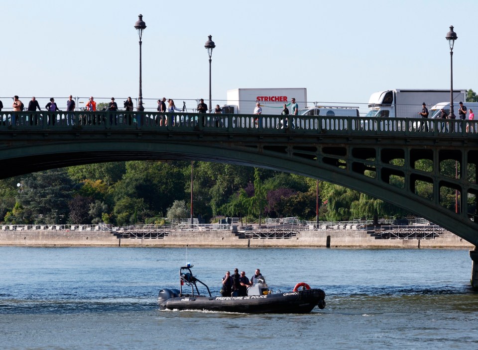 Police boat on the Seine River in Paris.