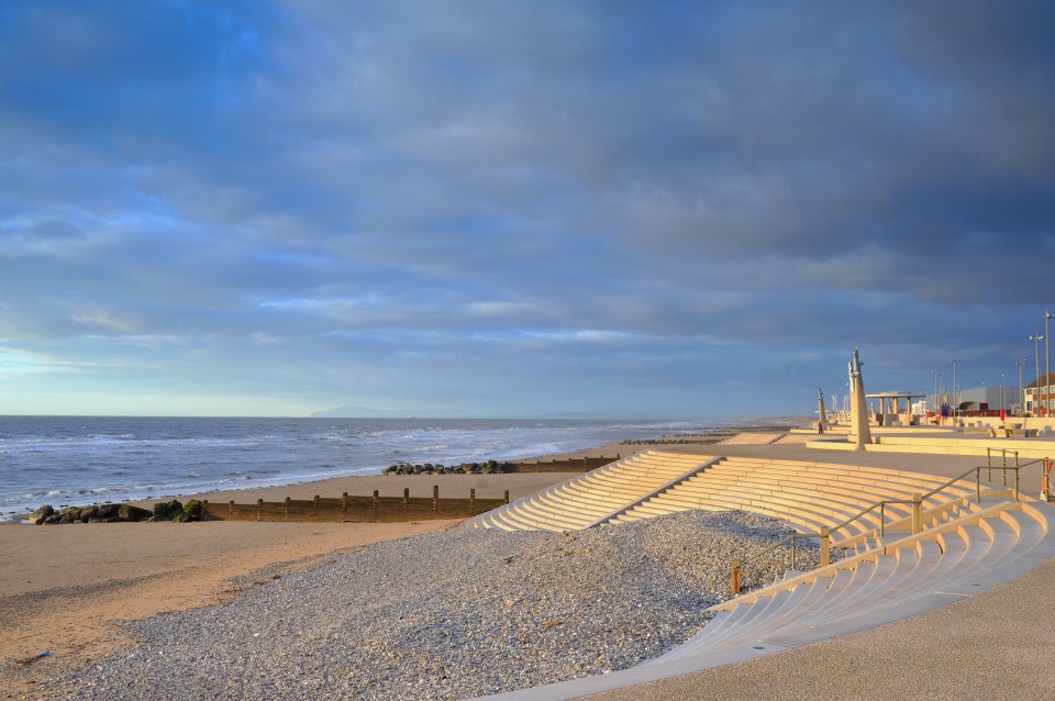 Beach with sea defenses and stone steps at Thornton Cleveleys.