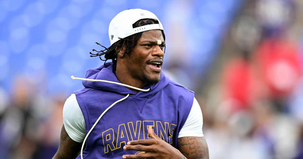 Lamar Jackson of the Baltimore Ravens warms up before the game against the Indianapolis Colts during the NFL Preseason 2025 at M&T Bank Stadium on Aug. 7, 2025, in Baltimore, Maryland.