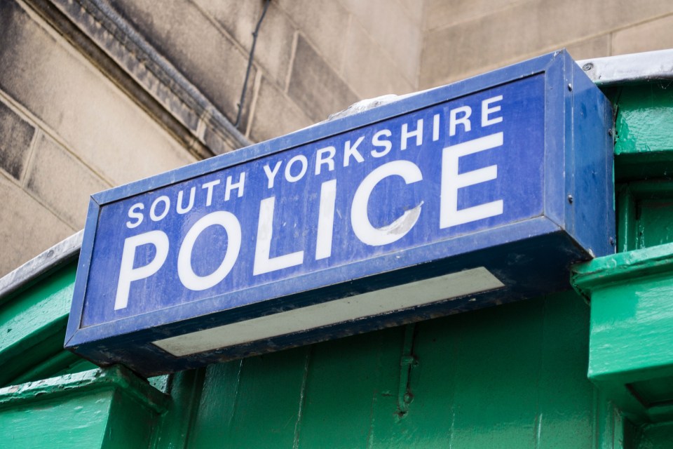 a blue sign that says south yorkshire police on it