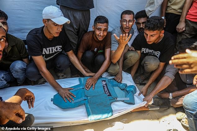 A funeral ceremony held in the courtyard of Nasser Hospital for Reuters photojournalist Hossam al-Masri, Al Jazeera cameraman Mohammed Salameh and journalist Mariam Abu Dagga