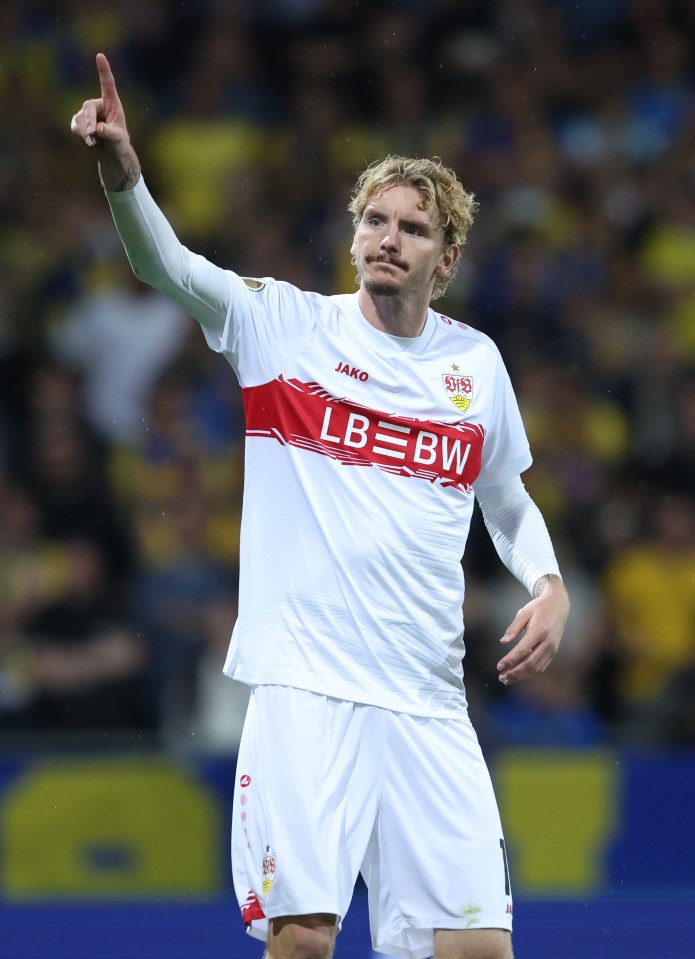 Nick Woltemade of VfB Stuttgart celebrating a goal.