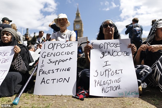 Supporters of Palestine Action attend a mass protest organized by the Defend Our Juries group on August 9