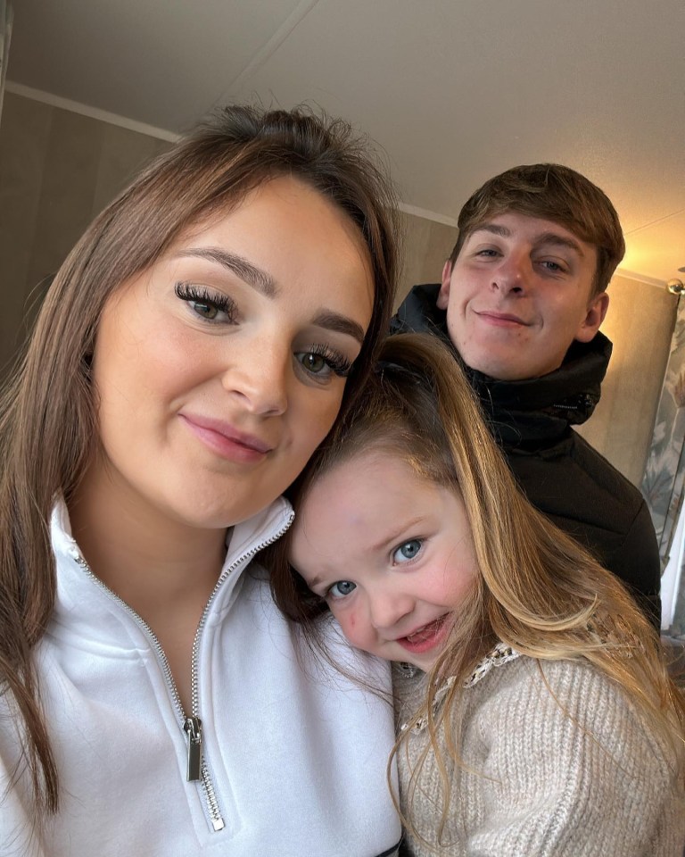 Millie Radford with her fiancé and daughter.