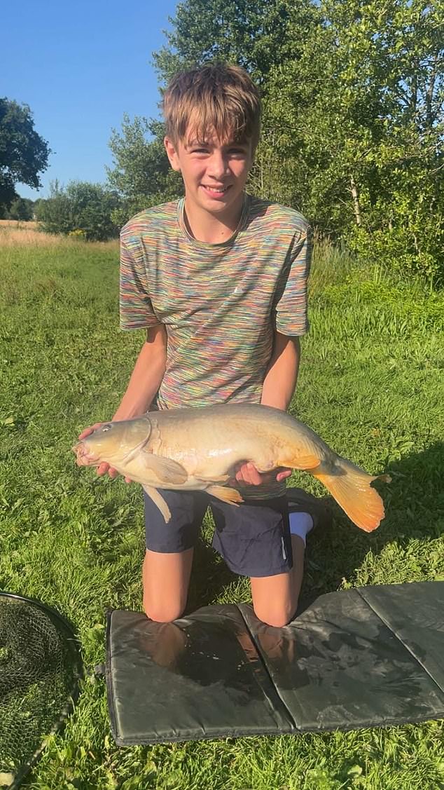Picture of Logan Carter posing on a fishing trip has been released with a tribute by his family