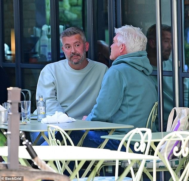 One of the big reasons Schofield is happy, say friends, is the support network he has around him - like Joshua and Scott (pictured left)