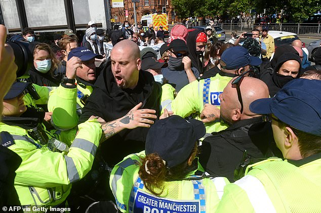 MANCHESTER: Protesters clash with police during a far-right protest