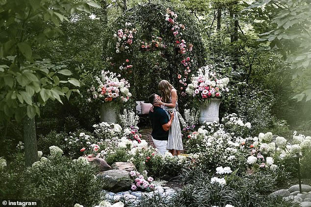 The billionaire singer accepted her boyfriend's marriage proposal on Tuesday after he got down on bended knee in a stunning engagement shoot