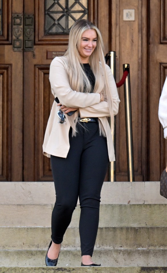 Photo of Megan Breen outside a courthouse.