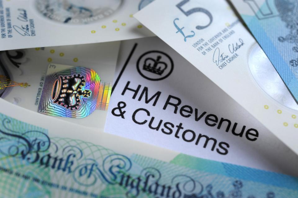 HM Revenue & Customs letter with British banknotes.