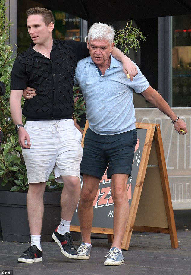 Last week he was pictured enjoying an afternoon at a bar with a friend, Joshua Sharman