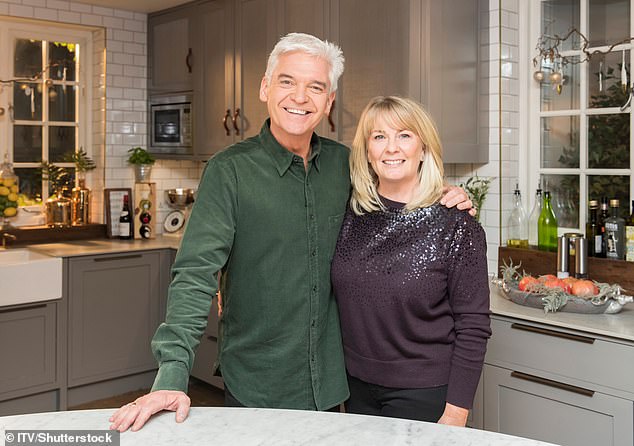 When he 'came out' as gay in 2020, Phillip Schofield said that he was relying on the continued love of his wife Steph (pictured together in 2019)
