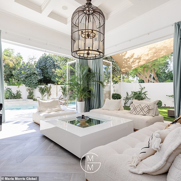 The property which was previously listed for 32.5million dirhams (£6,550,310.00) boasts a basement cinema as well as a rooftop terrace (Pictured: the open plan living room)