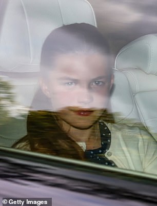 Princess Charlotte is the 'absolute double' of her father, say royal fans after she was pictured attending a Sunday church service in Balmoral (pictured left)