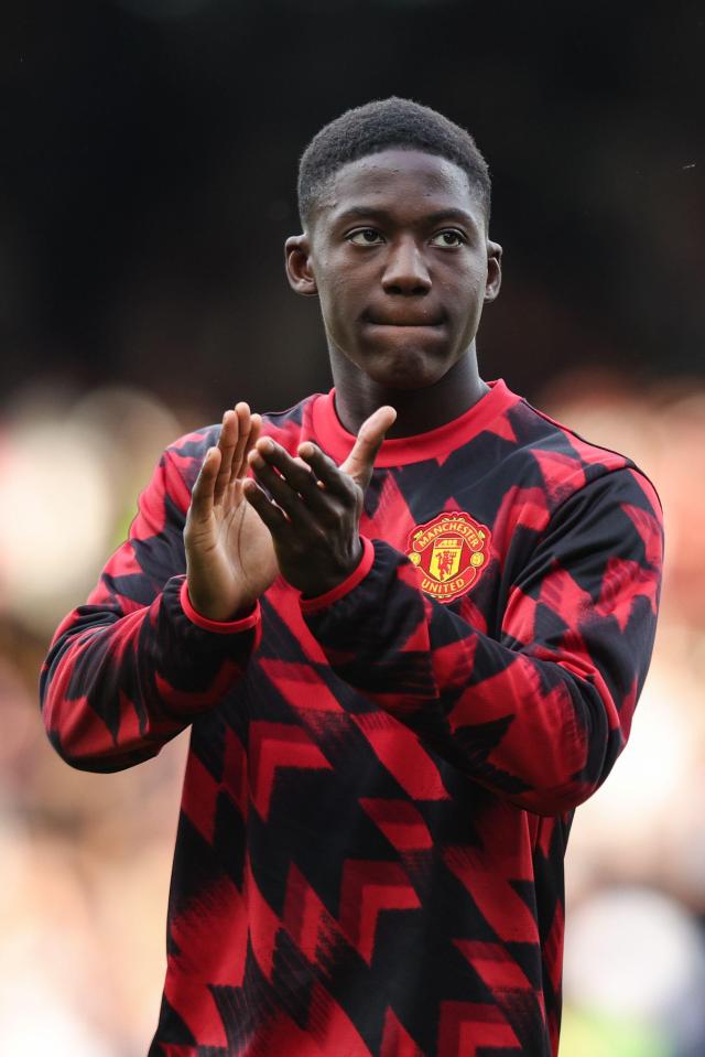Kobbie Mainoo of Manchester United applauding fans.