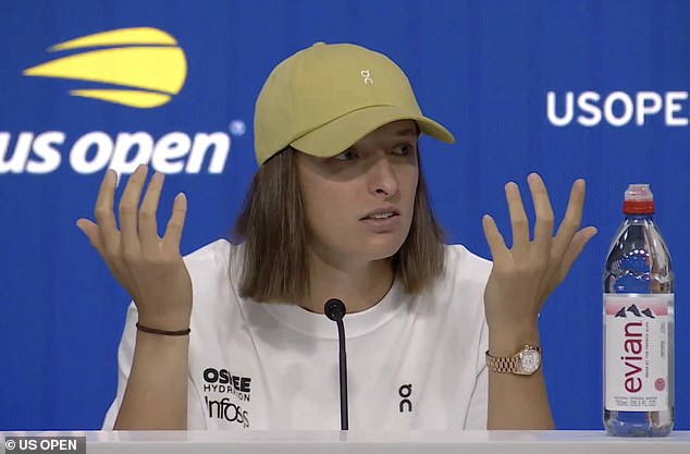 Iga Swiatek looked baffled when a reporter asked her if she was going to put beads in her hair