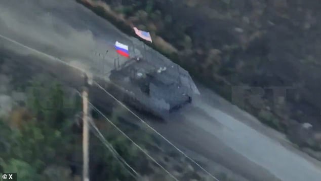 Russian troops have trolled Ukraine by flying an American flag on a captured US armoured vehicle ahead of Donald Trump 's meeting with Volodymyr Zelensky