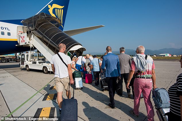 The woman was arrested upon the flight's arrival into Manchester Airport, Greater Manchester Police confirmed. When approached by The Daily Mail, Manchester Airport confirmed that the incident took place, but declined to comment (file image)