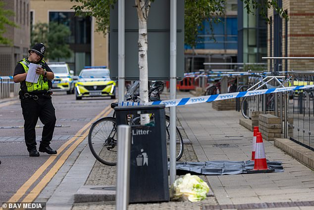 Police remained at the scene in Cambridge yesterday as officers continued their investigation