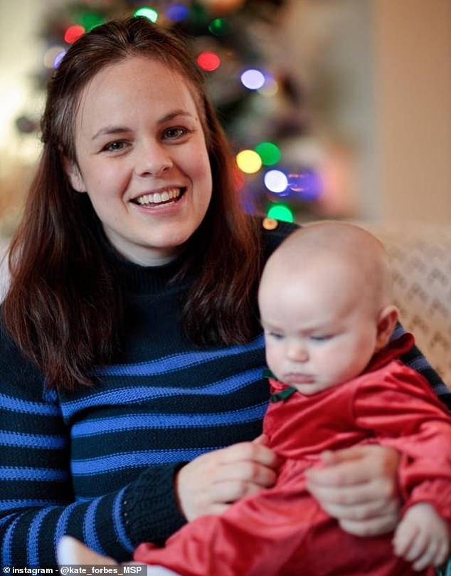 Kate Forbes (pictured with daughter Naomi) has said she is leaving politics to focus on motherhood