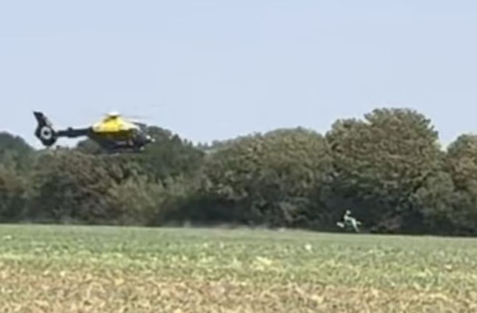 Helicopter pursuing a speeding motorcyclist.